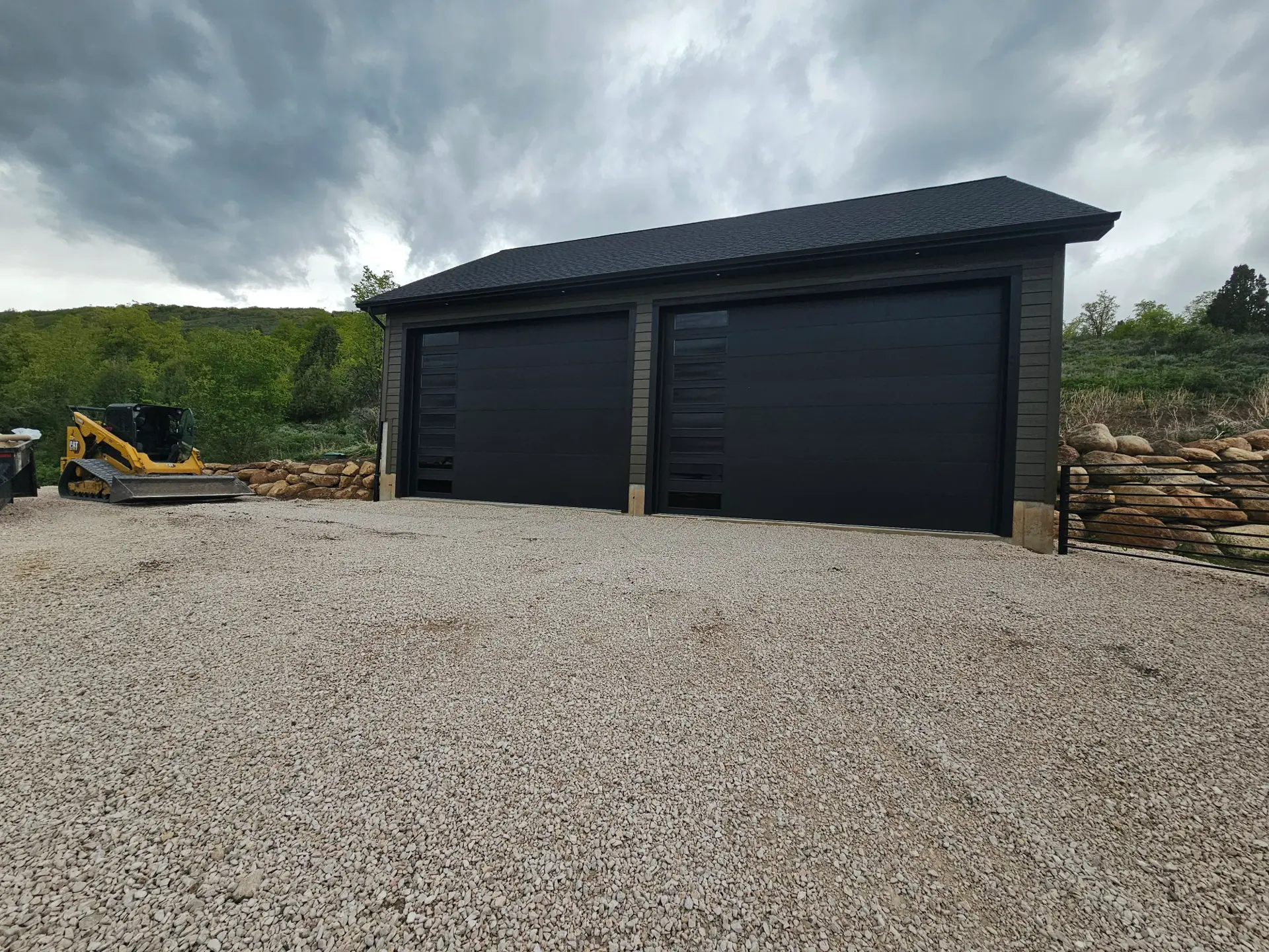 Engineered structural retaining walls blending into Cache Valley landscaping