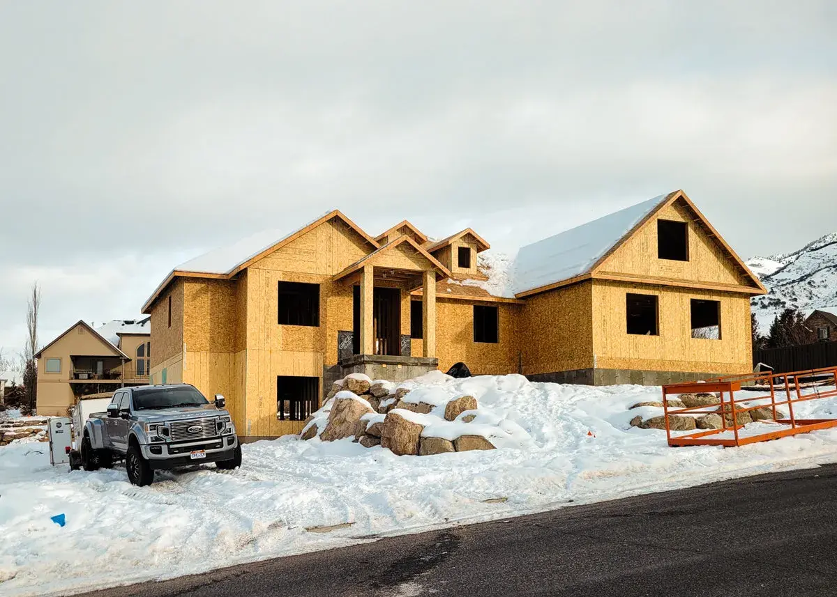 Massive roofline and architectural framing